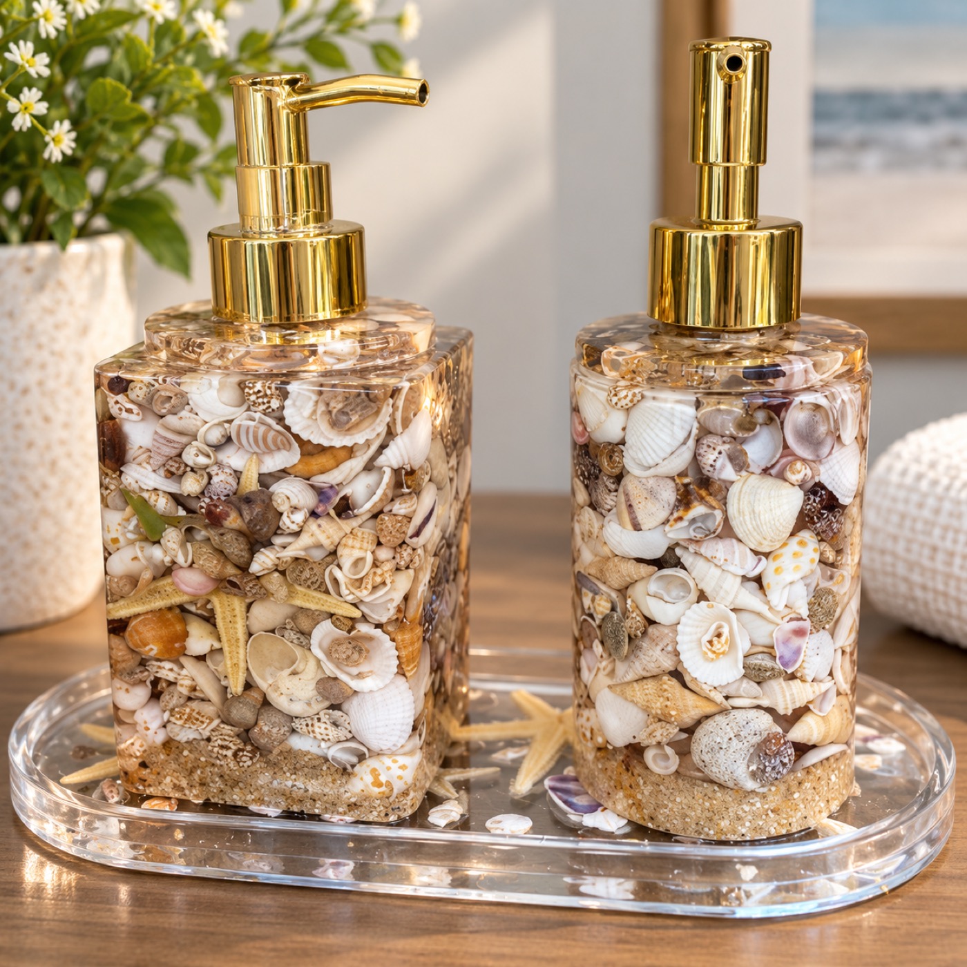 Tidepool Pair — resin soap and lotion dispensers filled with seashells and sand
